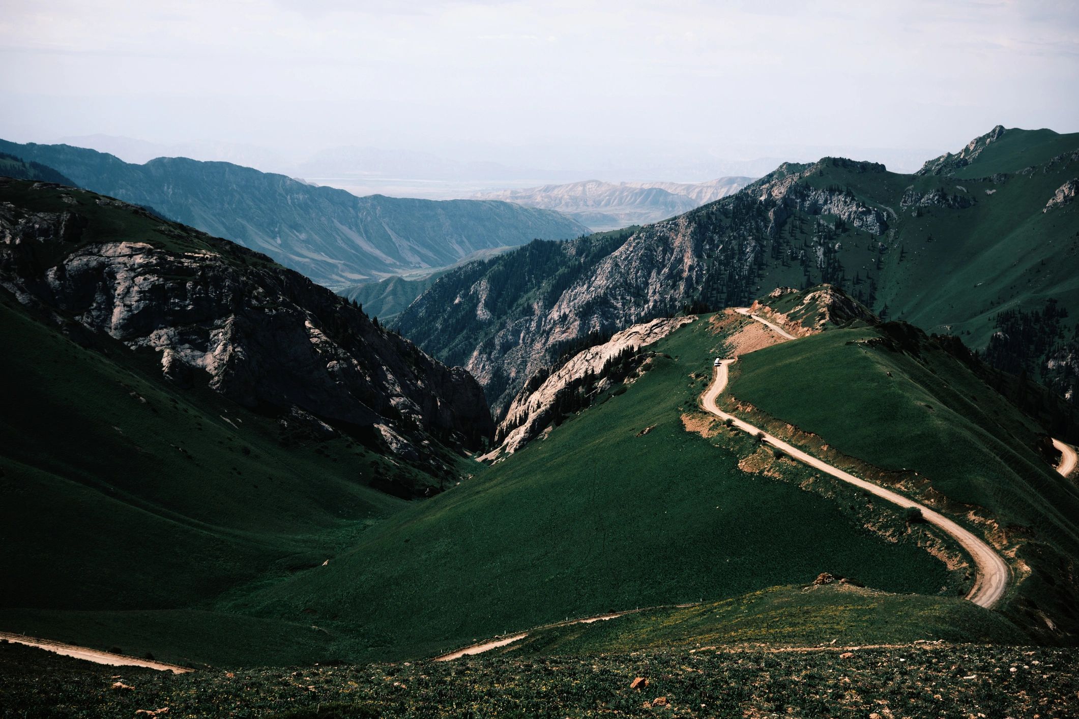 Quiet mountain path representing a calm way forward